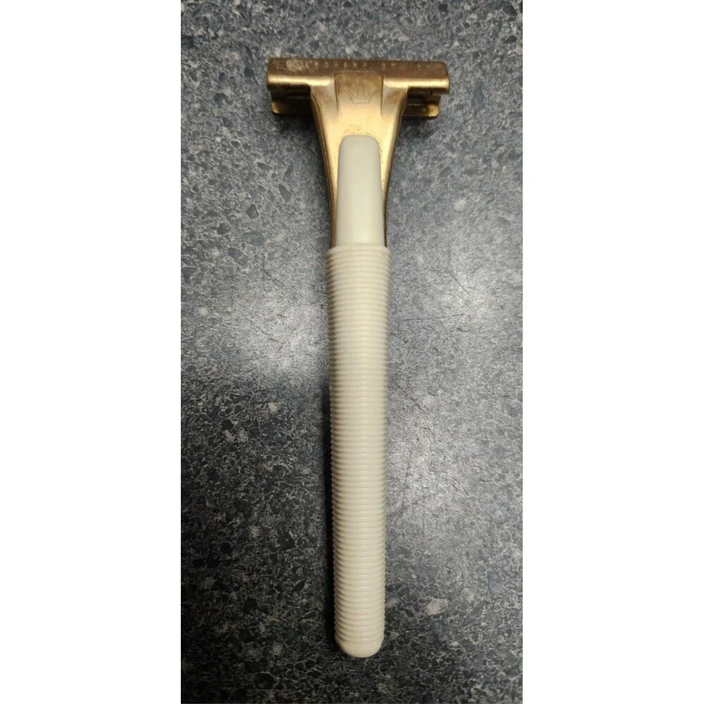 Eversharp Schick Safety Razor Gold Tone Head White Plastic Handle Metal